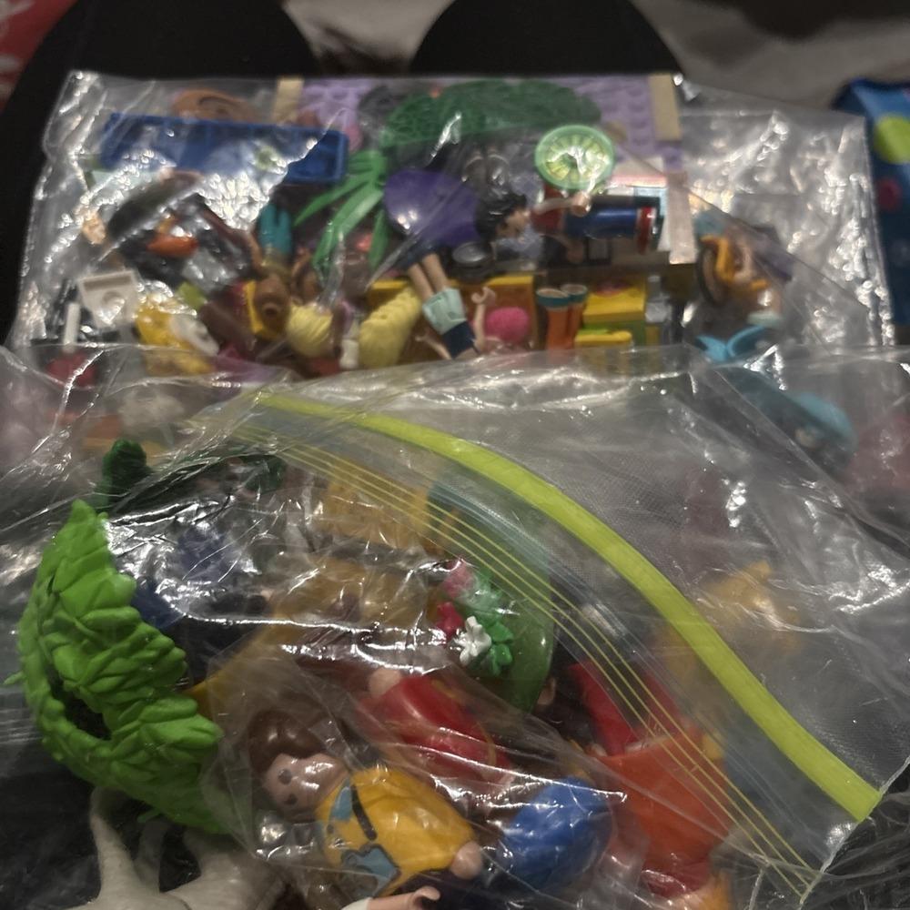 2 Bags of Misc Legos and Playmobile Building Blocks Includes People!!